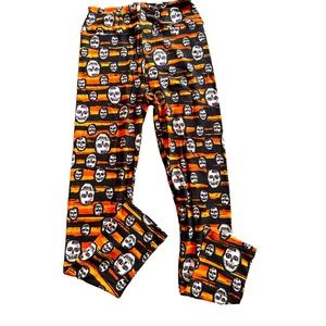 Lularoe one size Skull Halloween leggings with orange & black stripes.New in pkg